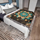 Decorative blanket with floral pattern on a bed in a bedroom setting